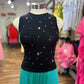 SLEEVELESS SHIRT WITH RHINESTONES